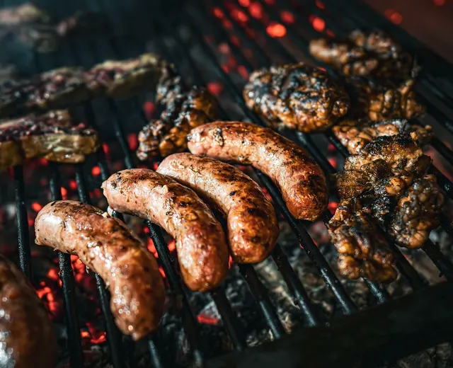 Meat cooking on a grill